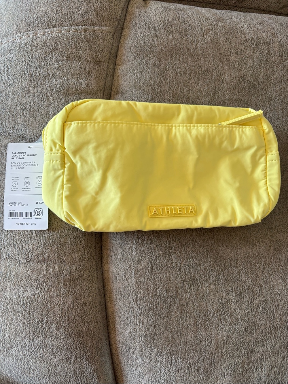 Athleta All About Large Crossbody Belt Bag 2L in a butter yellow color